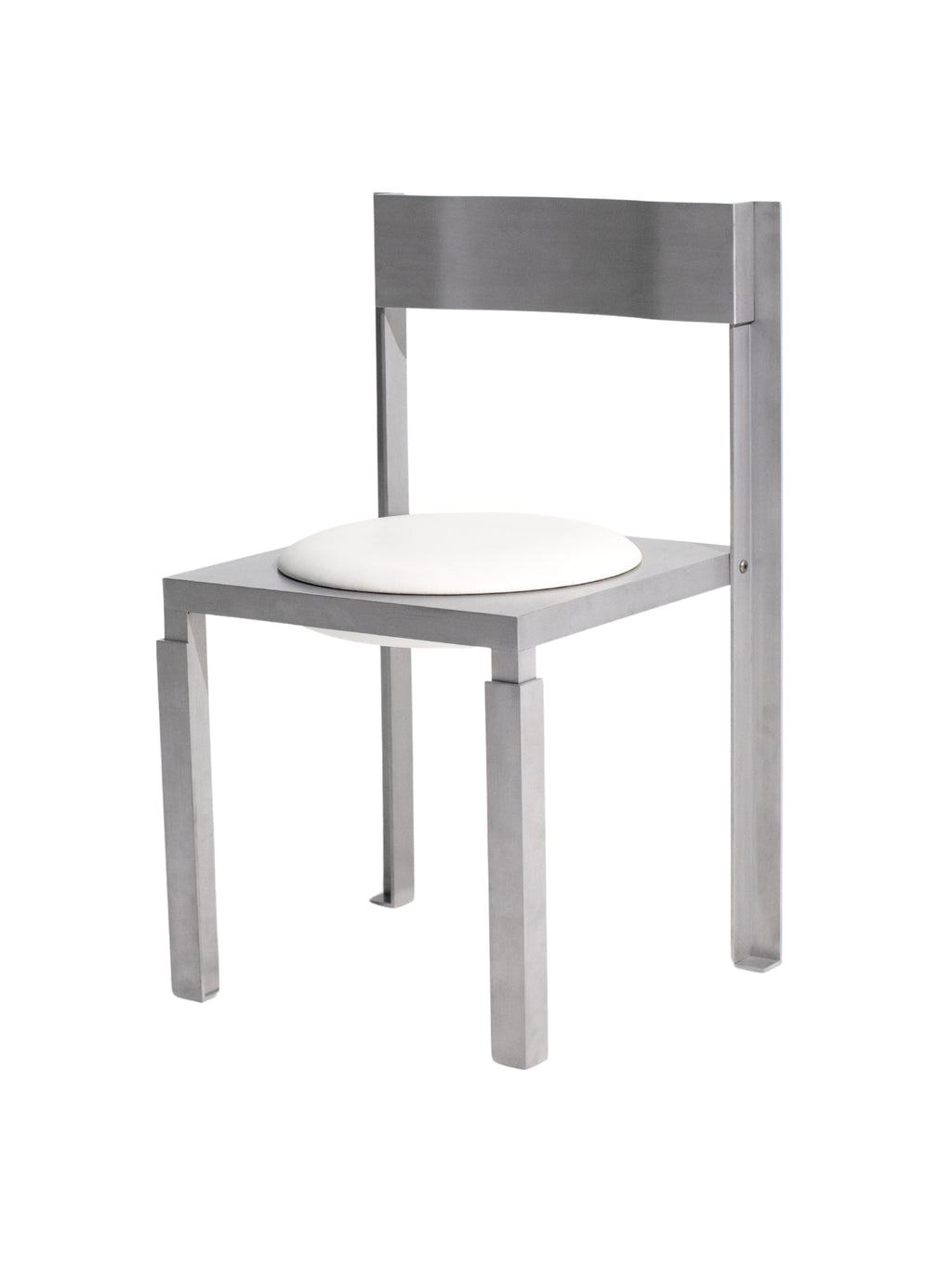 YET. Strut Chair, a modern minimalist dining chair crafted from brushed silver-grey metal with a bold, geometric, and brutalist-inspired design.