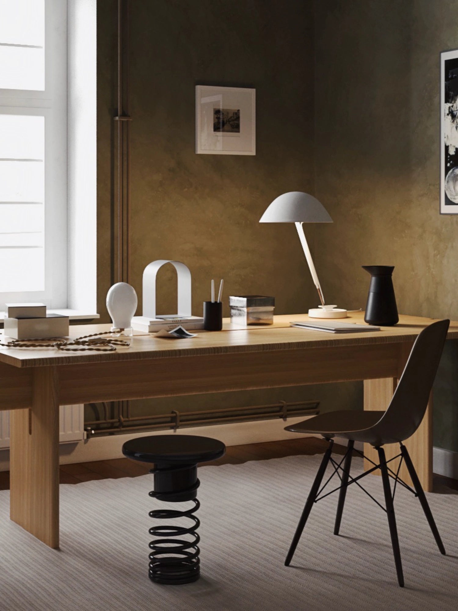 YET. Twist Stool, a striking black contemporary accent stool featuring a glossy round top and a bold, oversized helical spring base with a sleek lacquered finish.
