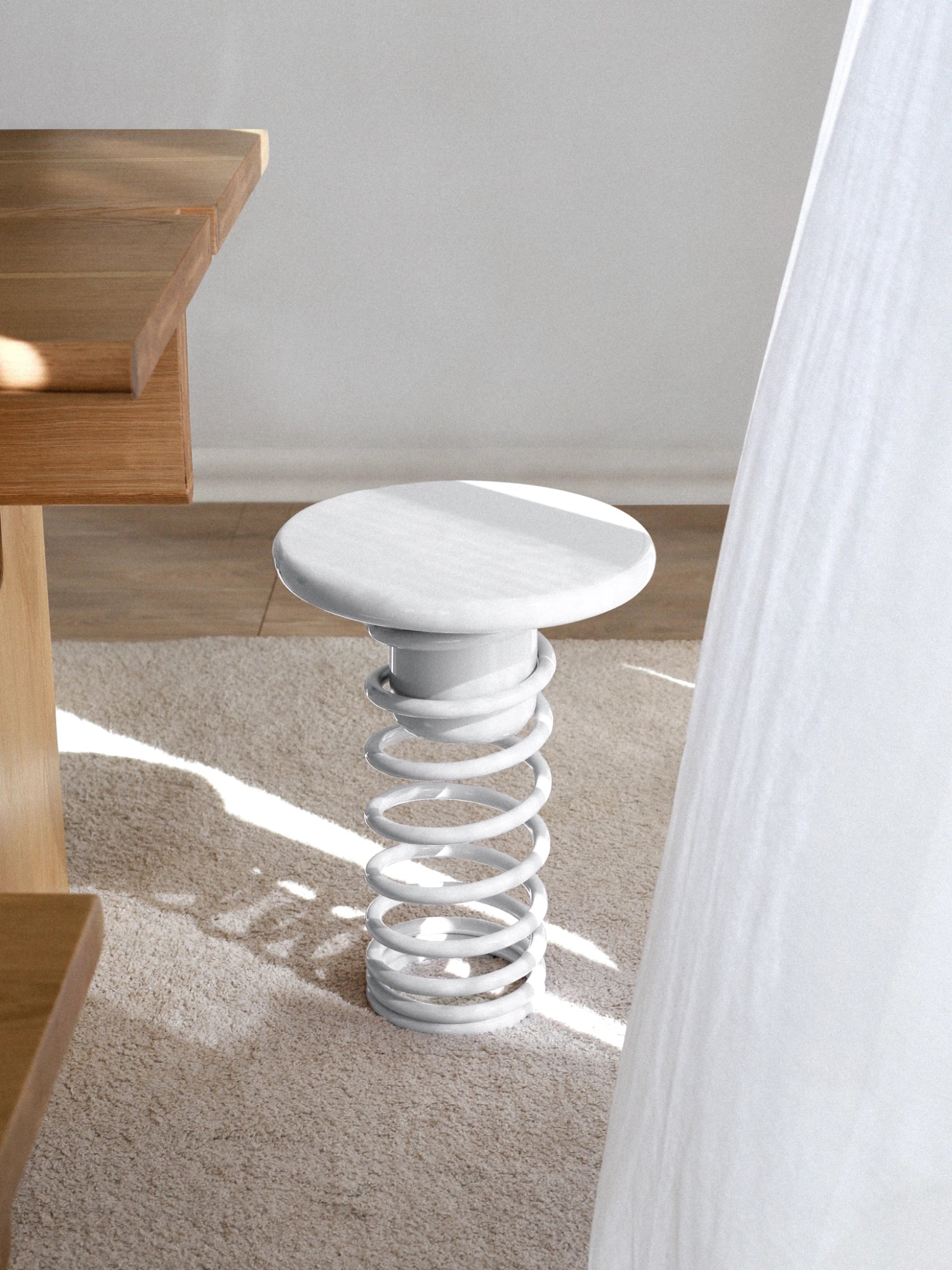 YET. Twist Stool, a contemporary sculptural white stool featuring a smooth, round white seat and a distinctive helical white metal spring base.